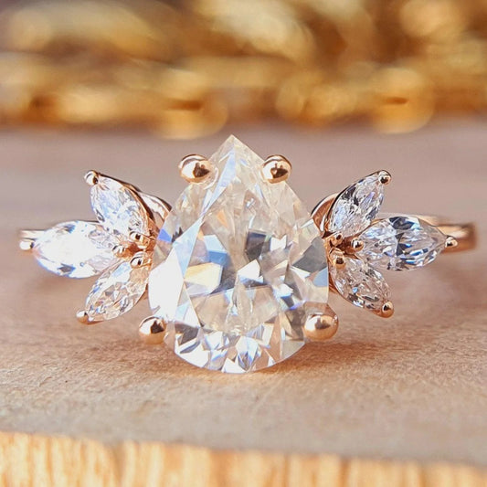3.0 CT Pear Cut Lab Grown Diamond Engagement Ring with a cluster setting. A unique vintage-inspired birthday gift for her.