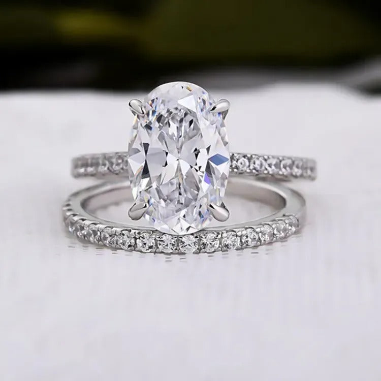 2 CT Oval Cut Lab Grown Diamond Engagement Ring Bridal Set with a dazzling pave setting. The perfect Anniversary Day gift set for her.
