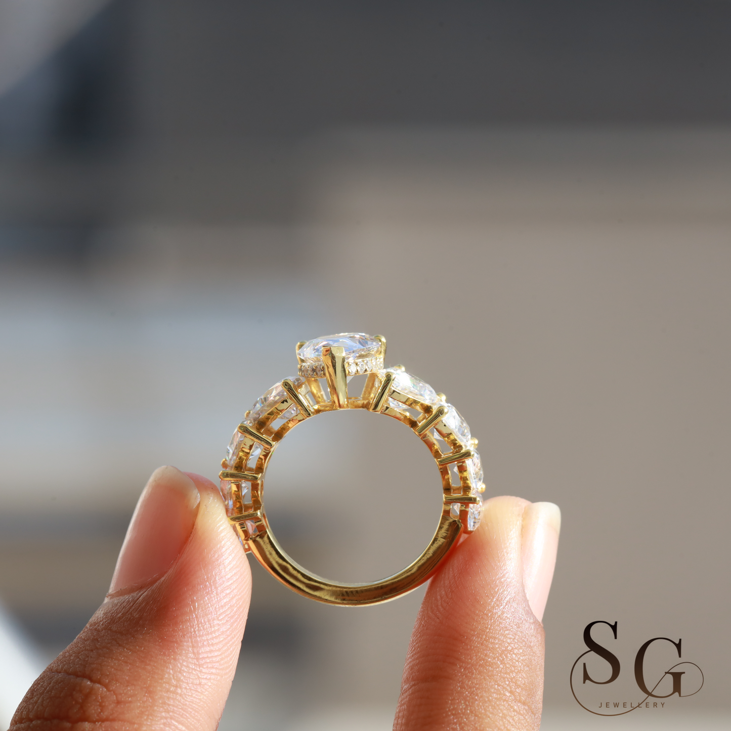 Pear Lab Diamond Hidden Halo Engagement Ring for Anniversary Celebrations.