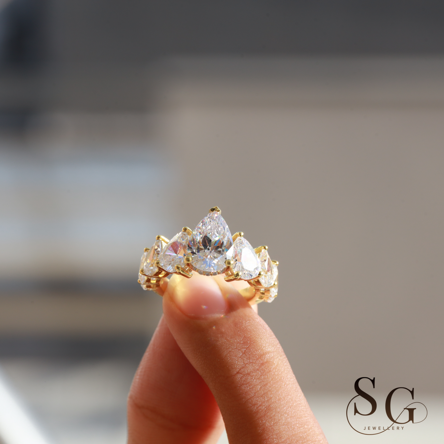 Pear Lab Diamond Hidden Halo Engagement Ring for Anniversary Celebrations.